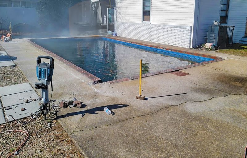 Pool coping renovation with new cantilever edge