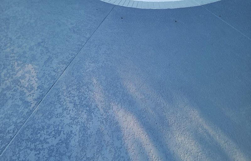 Stamped concrete pool deck resurfacing