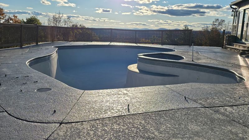 Pool plaster repair with polymer concrete coating