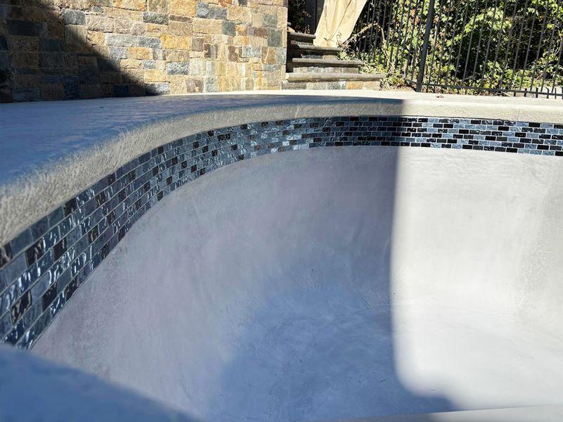Pool renovation project 27 waterline tile