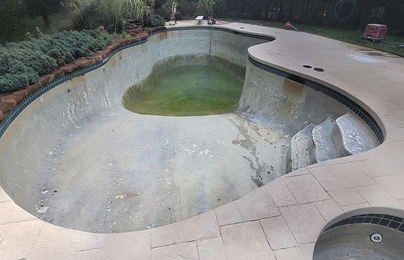 Pool renovation project 20 waterline tile