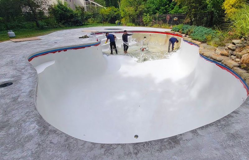 Swimming pool renovation project 21 resurfaced deck