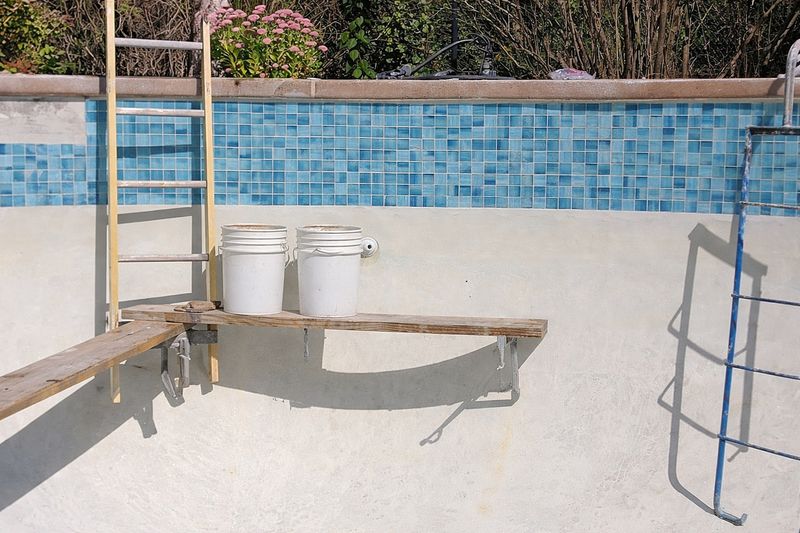 Waterline tile renovation with mosaic pattern